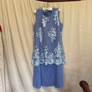 Elegant Blue Sleeveless Dress with Lace Overlay